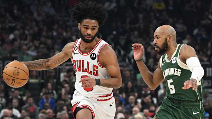 ; Chicago Bulls guard Coby White (0) pushes the ball up the court against Milwaukee Bucks guard Jevon Carter (5)